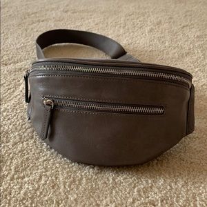 Barney’s grey-taupe spacious leather belt bag